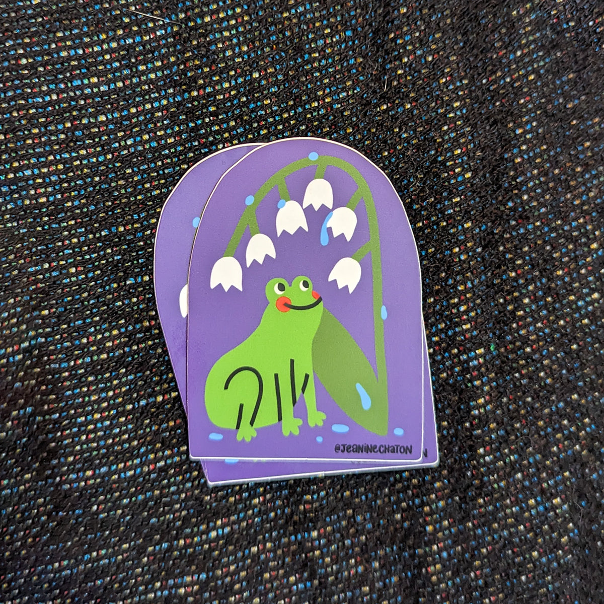 Autocollant grenouille sous le muguet