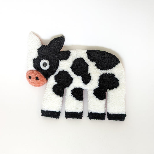 Small decorative cow tapestry